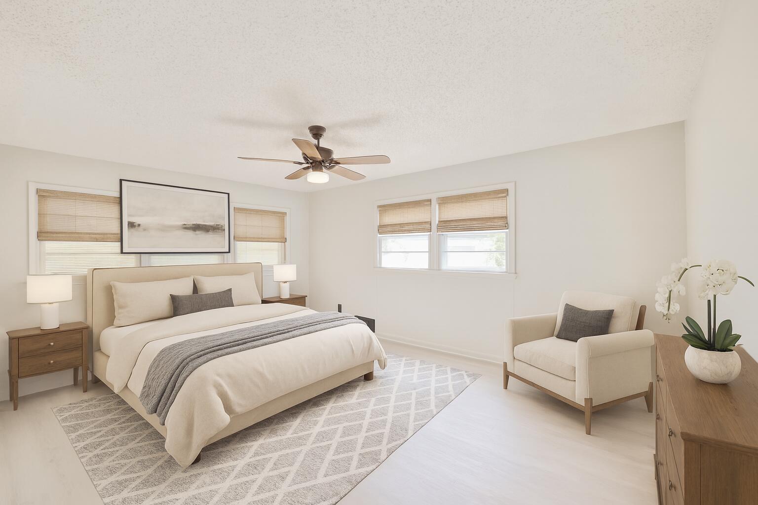 3202 45th Street Lubbock, TX 79413 - Photo 17 of 23 a bedroom with a bed and a couch