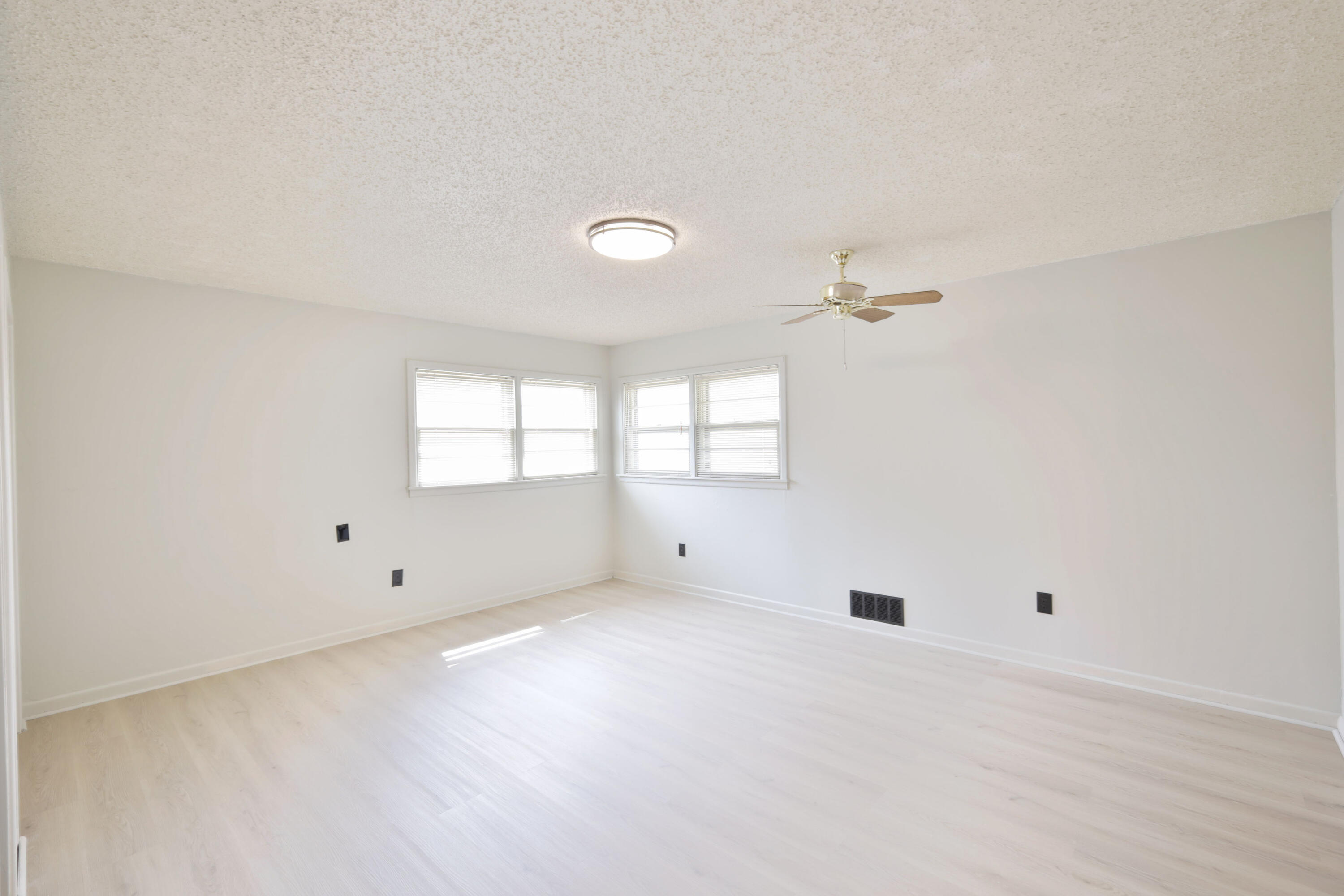 3202 45th Street Lubbock, TX 79413 - Photo 19 of 23 a view of an empty room with a window