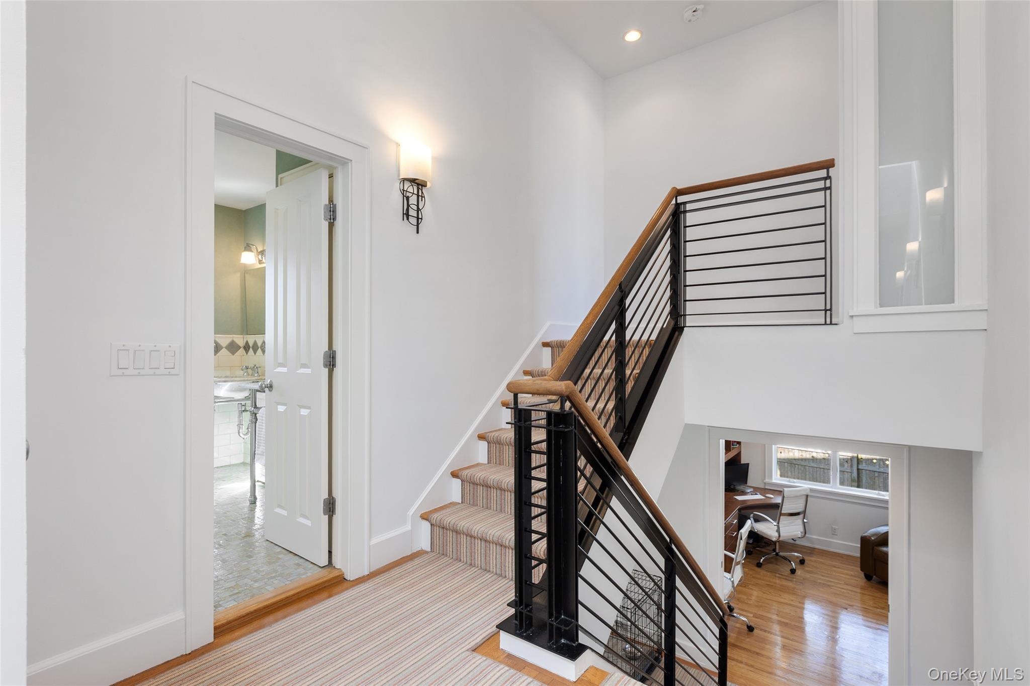 4 Trails End Rye, NY 10580 - Photo 19 of 44 a view of a hallway with wooden floor and staircase
