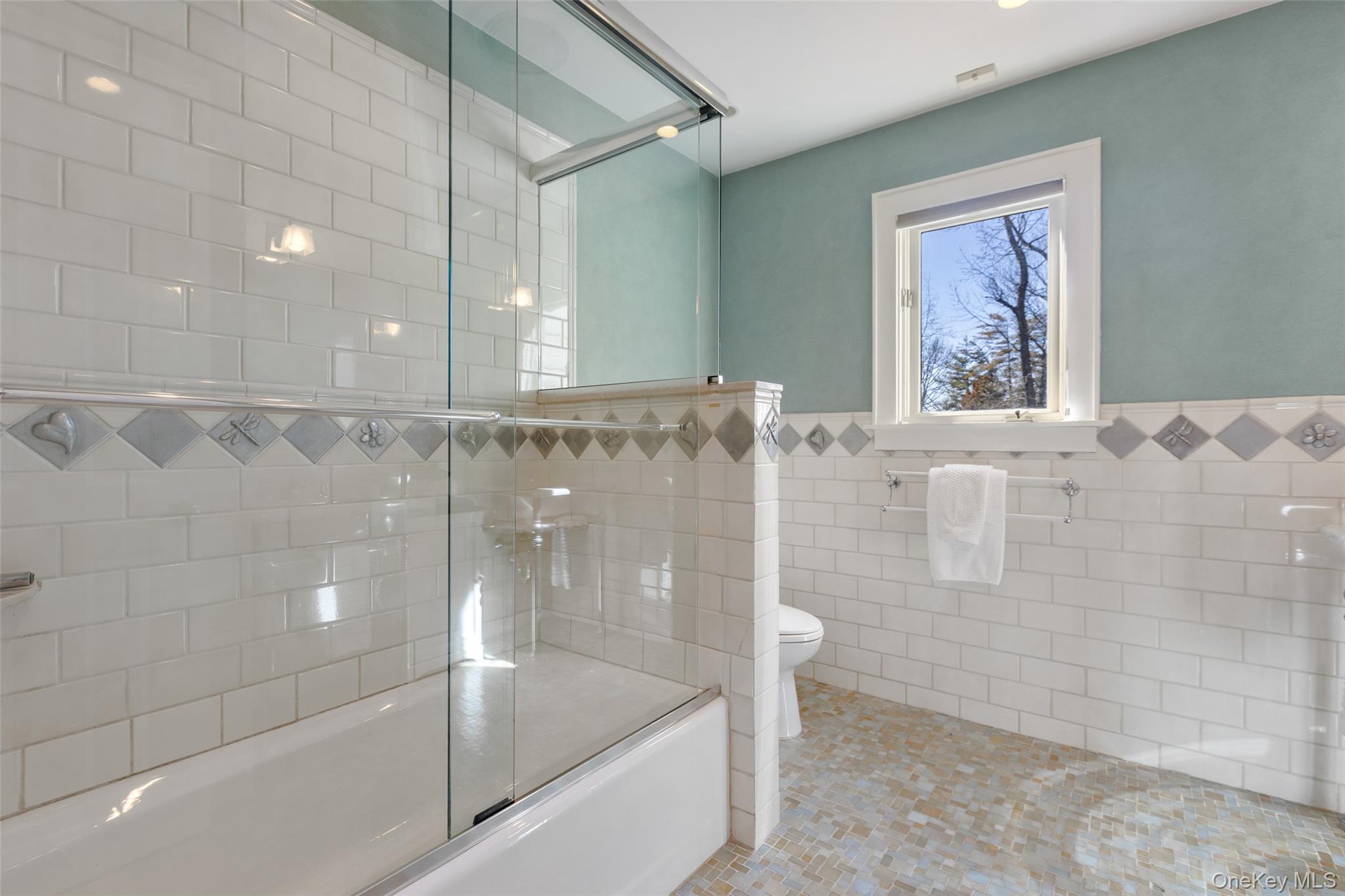 4 Trails End Rye, NY 10580 - Photo 31 of 44 a bathroom with a bathtub and a shower