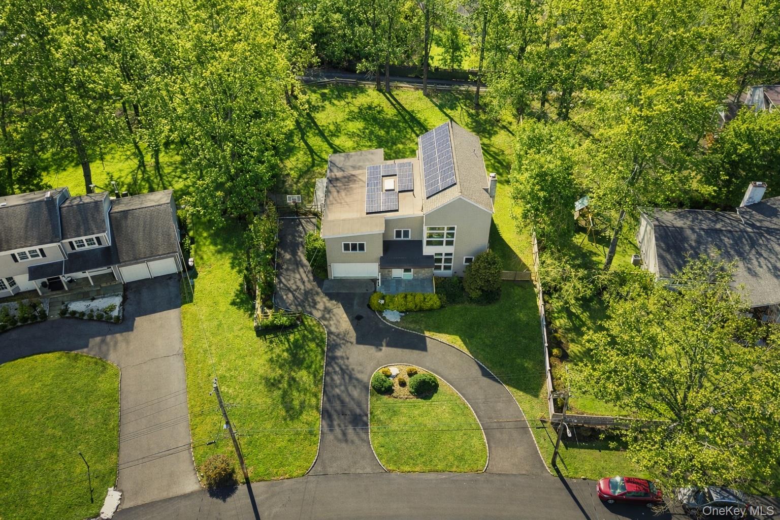4 Trails End Rye, NY 10580 - Photo 36 of 44 an aerial view of a house with a yard basket ball court and outdoor seating