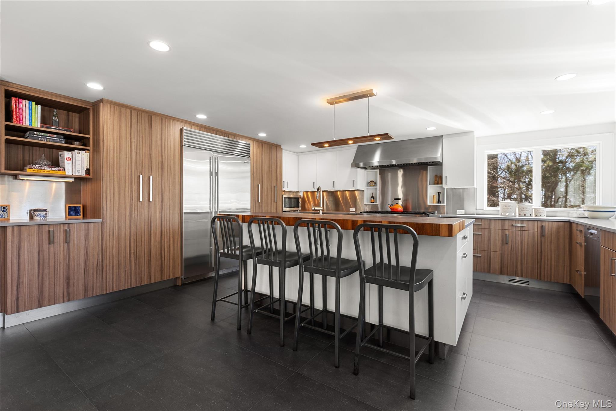 4 Trails End Rye, NY 10580 - Photo 7 of 44 a kitchen with a table chairs sink and cabinets