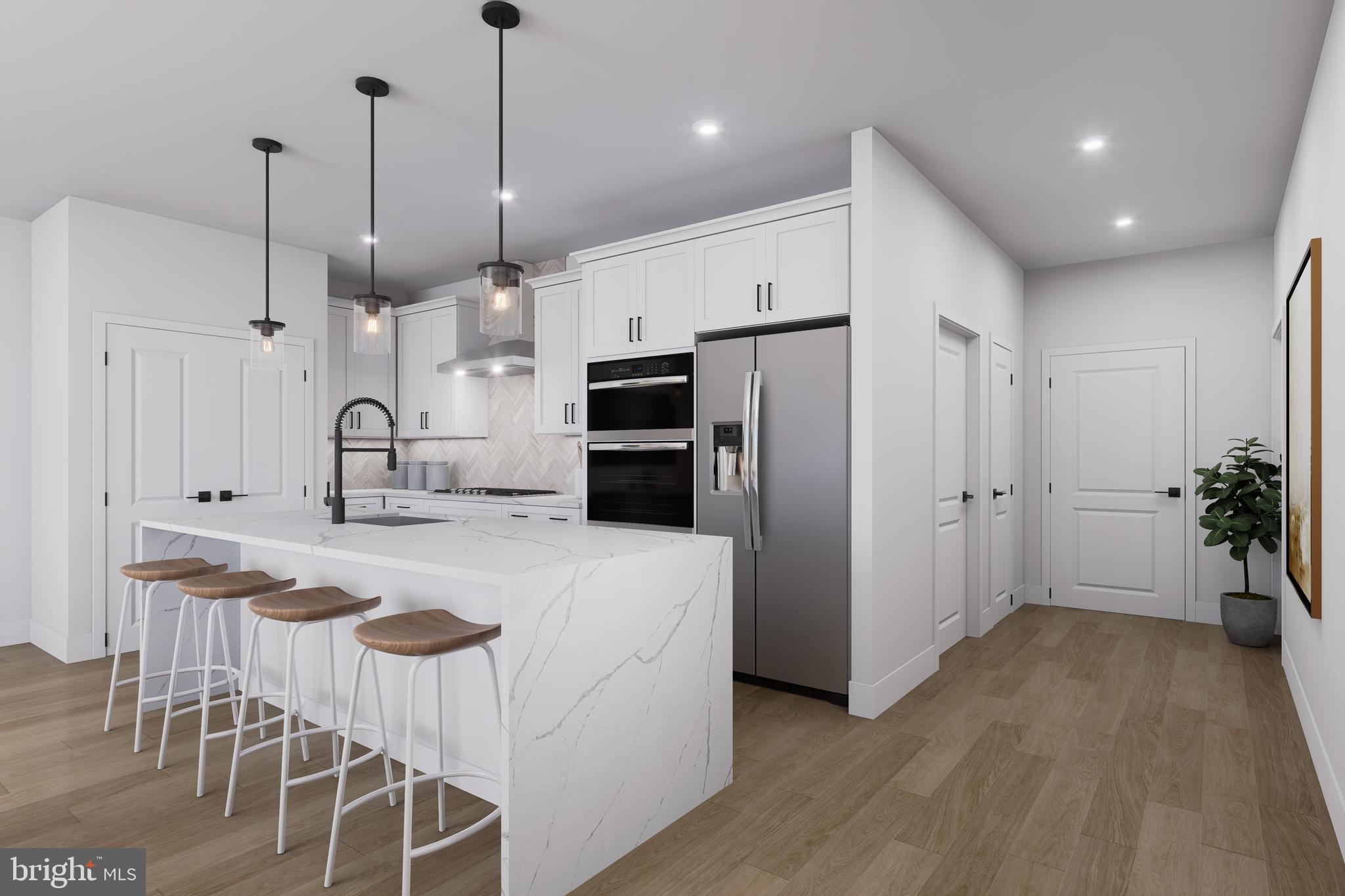1121 Fortune Terrace, Unit 7 Potomac, MD 20854 - Photo 3 of 10 a kitchen with stainless steel appliances granite countertop a refrigerator a sink a stove a dining table and chairs