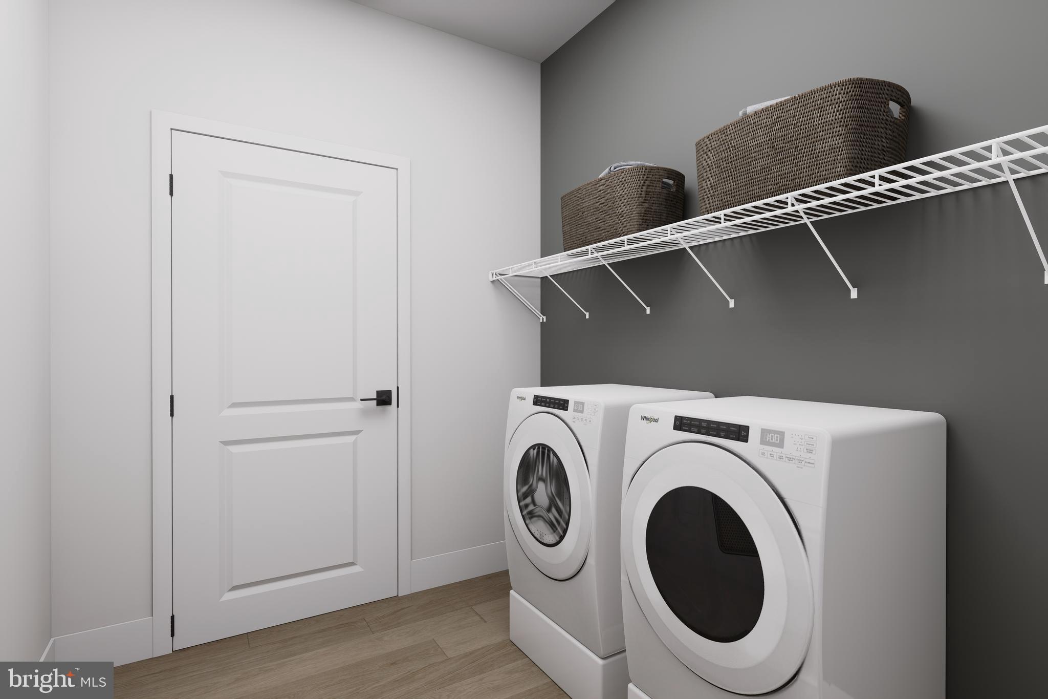 1121 Fortune Terrace, Unit 7 Potomac, MD 20854 - Photo 9 of 10 a utility room with dryer and washer