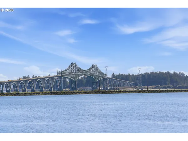 a view of large body of water and mountain view