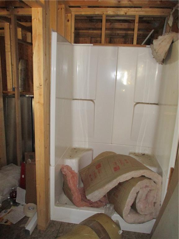 156 Doyle Road Sarver, PA 16055 - Photo 11 of 25 a bedroom with a bed and a walk in closet