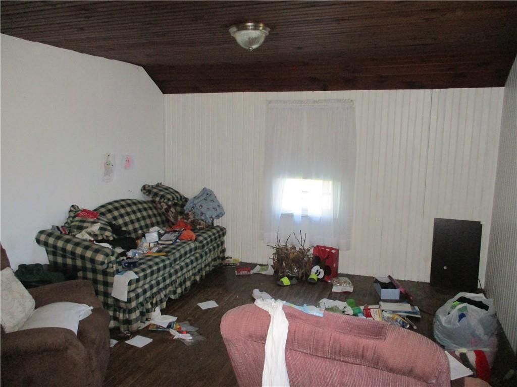 156 Doyle Road Sarver, PA 16055 - Photo 16 of 25 a living room with furniture and flowers