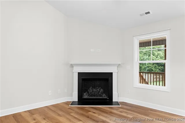 a living room with a fireplace