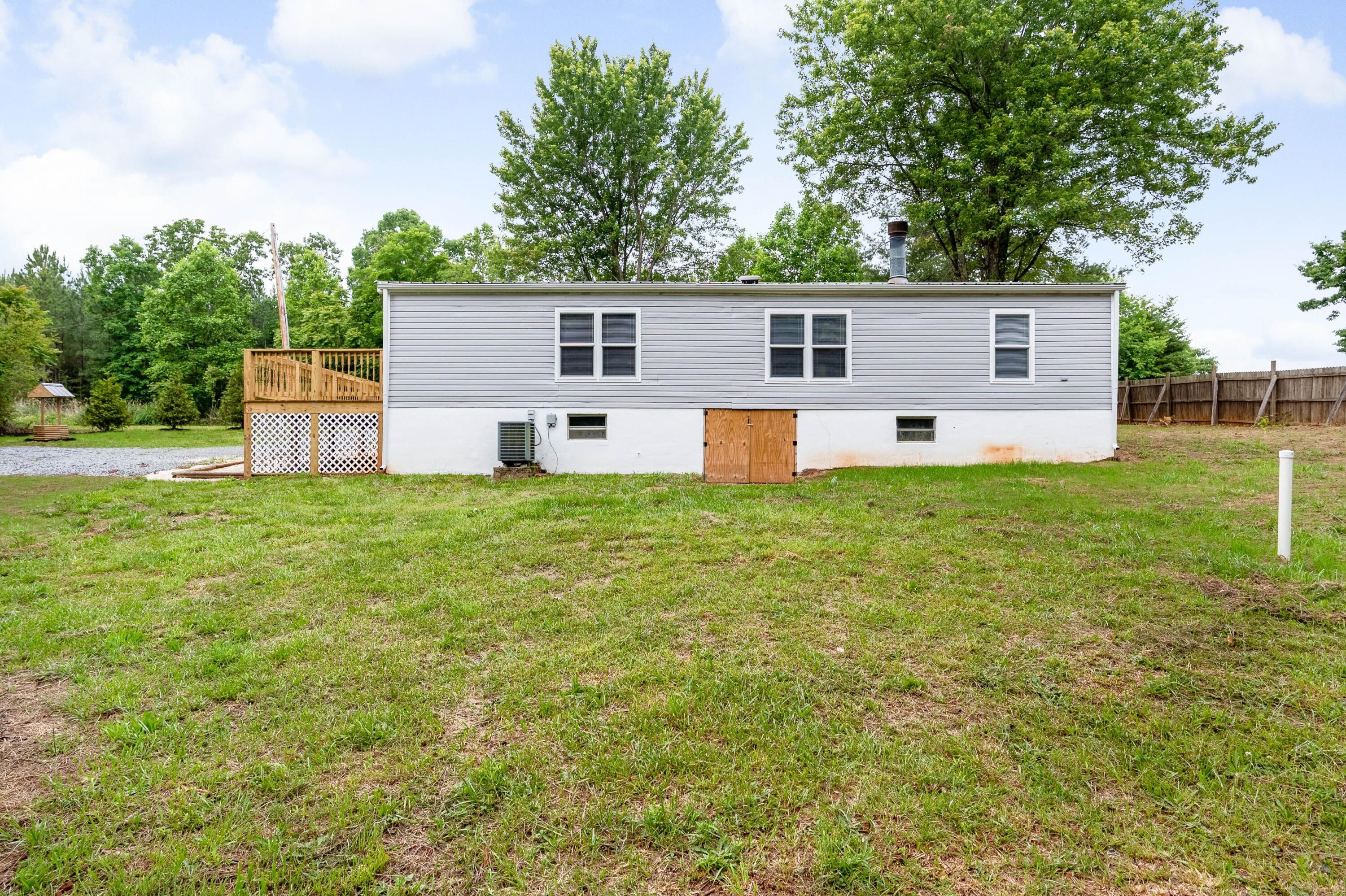 4342 County Line Road Patrick Springs, VA 24133 - Photo 12 of 34 a view of a house with a yard