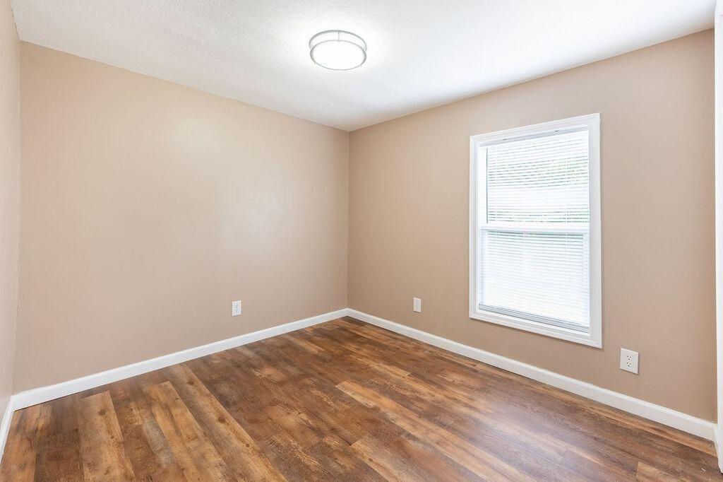 4342 County Line Road Patrick Springs, VA 24133 - Photo 25 of 34 an empty room with a window