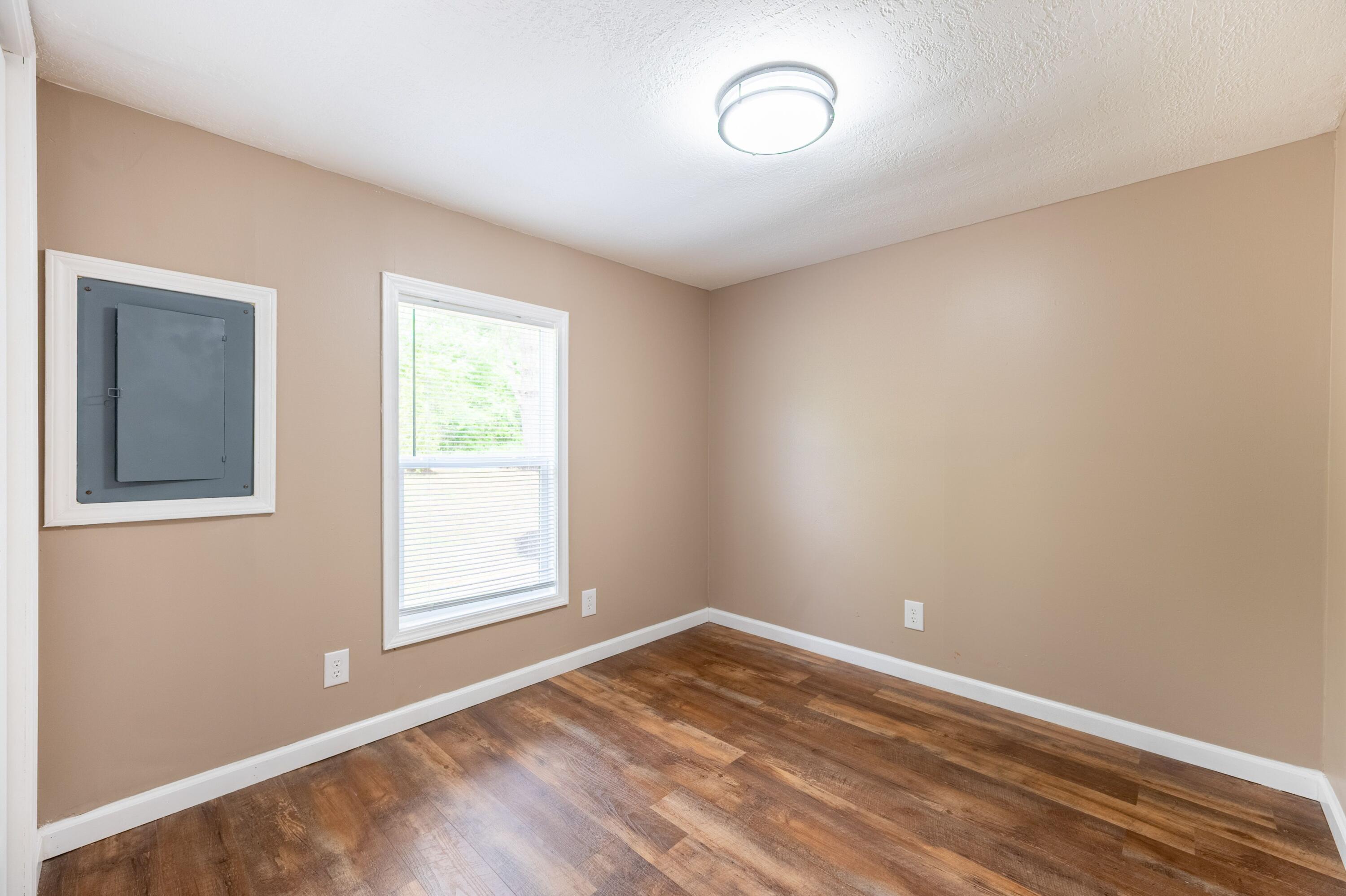 4342 County Line Road Patrick Springs, VA 24133 - Photo 28 of 34 an empty room with a window