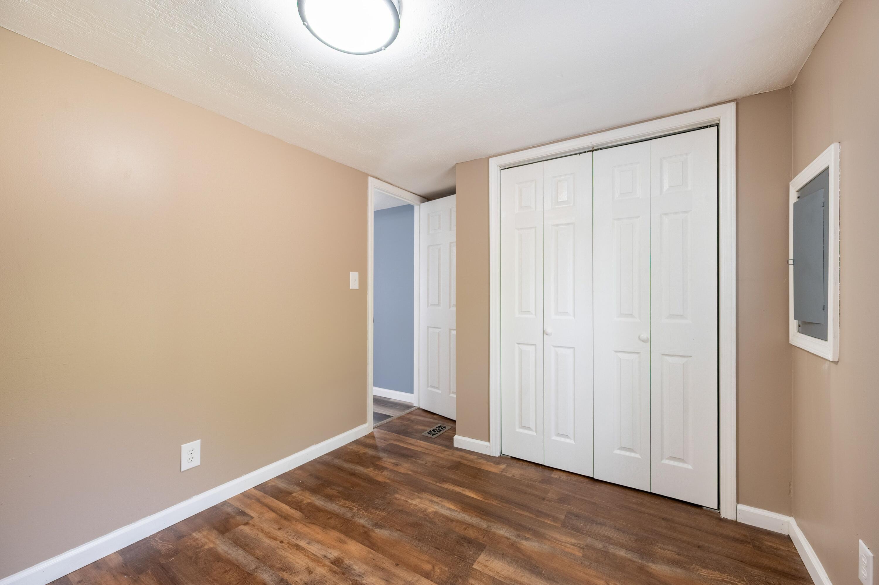 4342 County Line Road Patrick Springs, VA 24133 - Photo 29 of 34 a view of a room with wooden floor and entryway