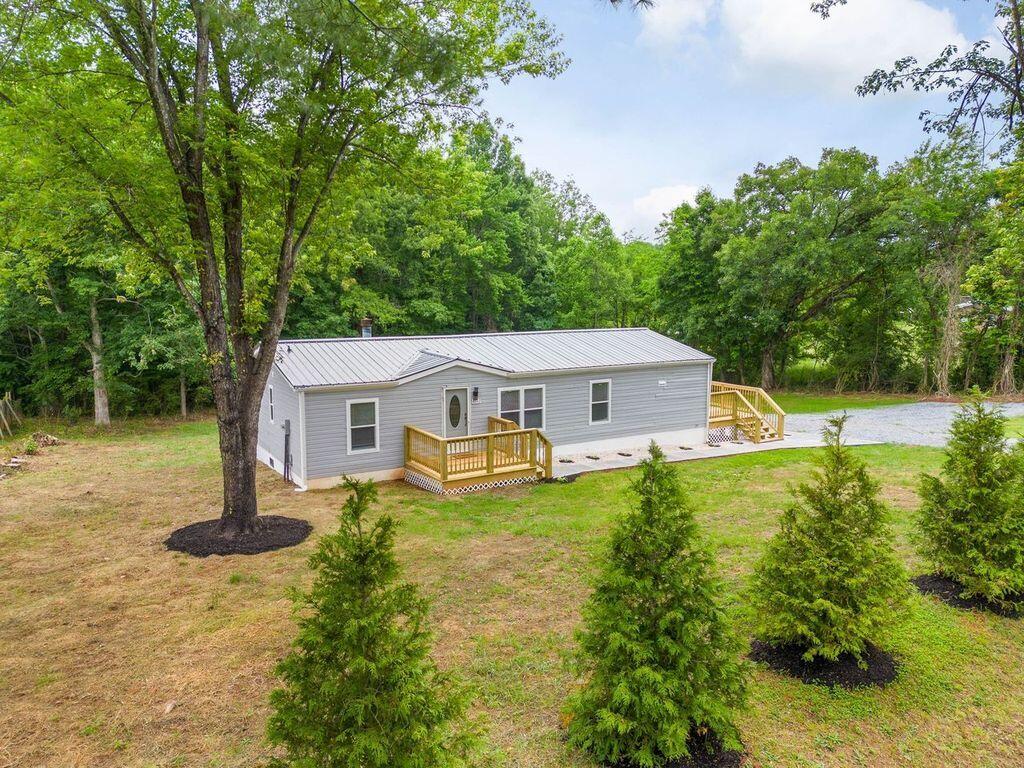 4342 County Line Road Patrick Springs, VA 24133 - Photo 30 of 34 a house view with a garden space