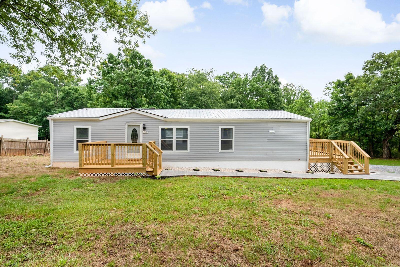 4342 County Line Road Patrick Springs, VA 24133 - Photo 3 of 34 a view of a house with a yard
