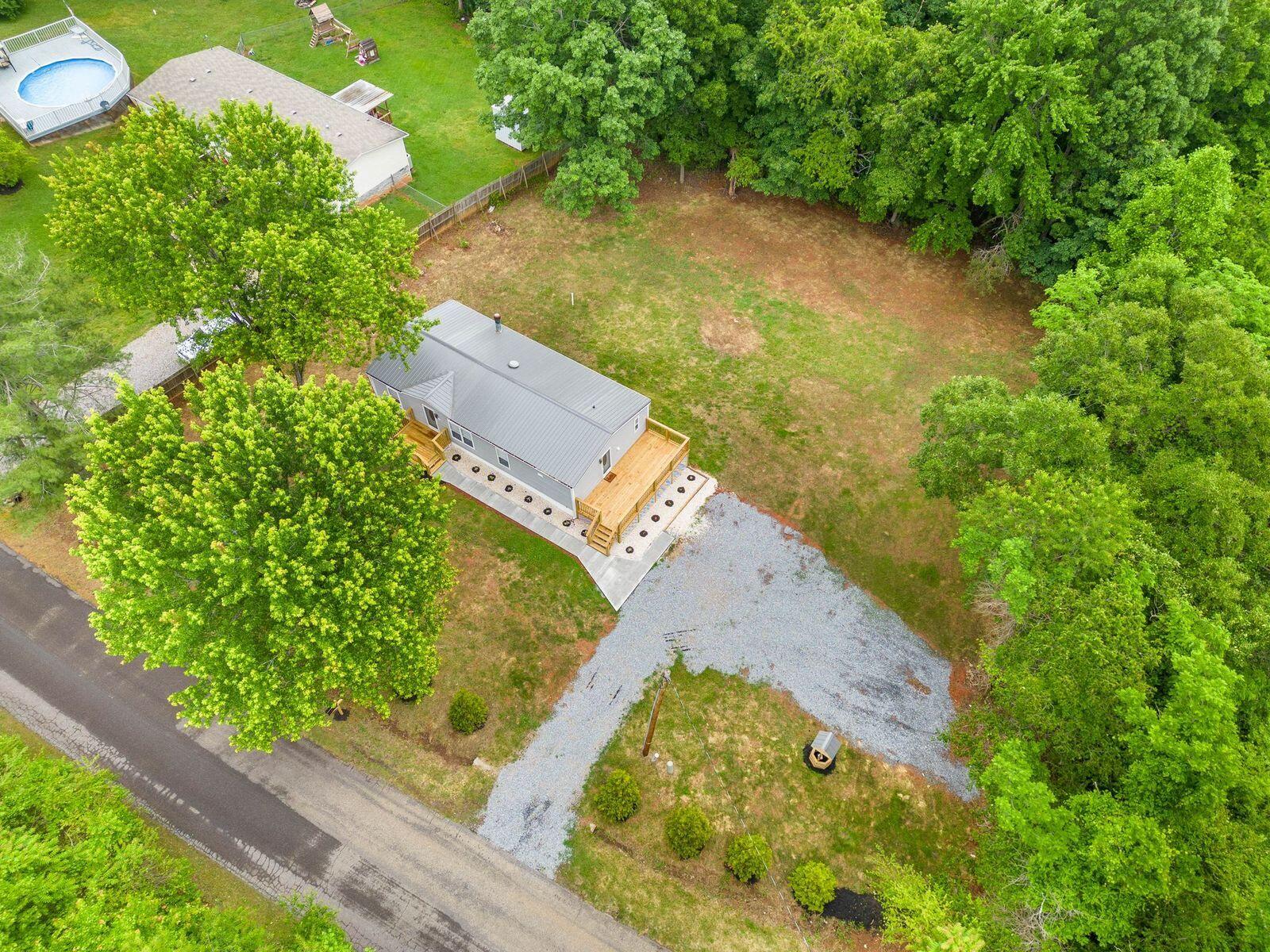 4342 County Line Road Patrick Springs, VA 24133 - Photo 34 of 34 an aerial view of a house with a yard