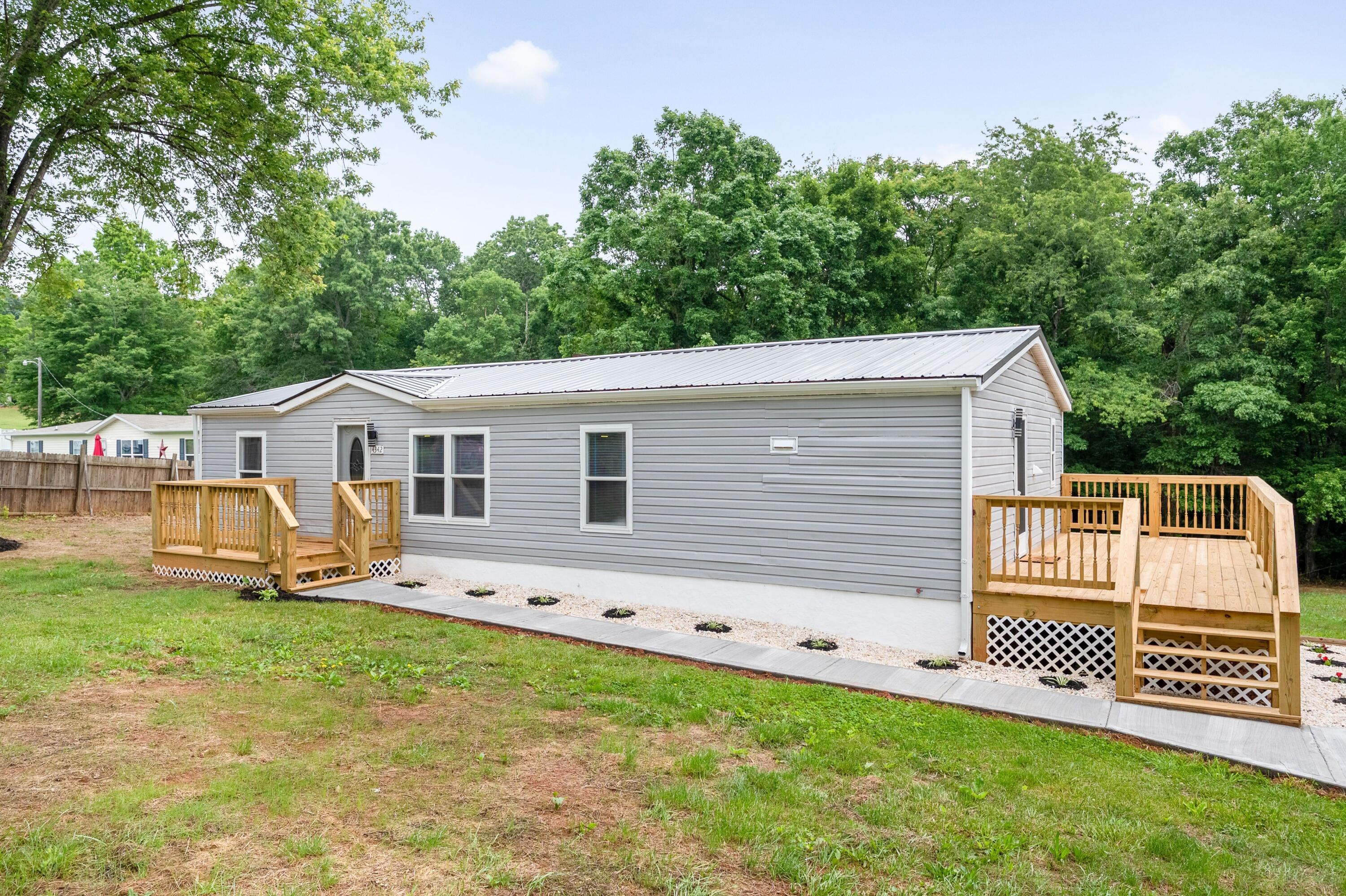 4342 County Line Road Patrick Springs, VA 24133 - Photo 5 of 34 a view of a house with a yard