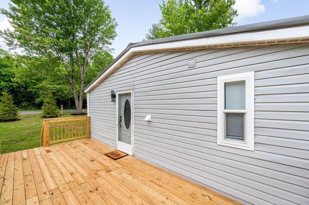4342 County Line Road Patrick Springs, VA 24133 - Photo 8 of 34 a view of backyard with deck and trees