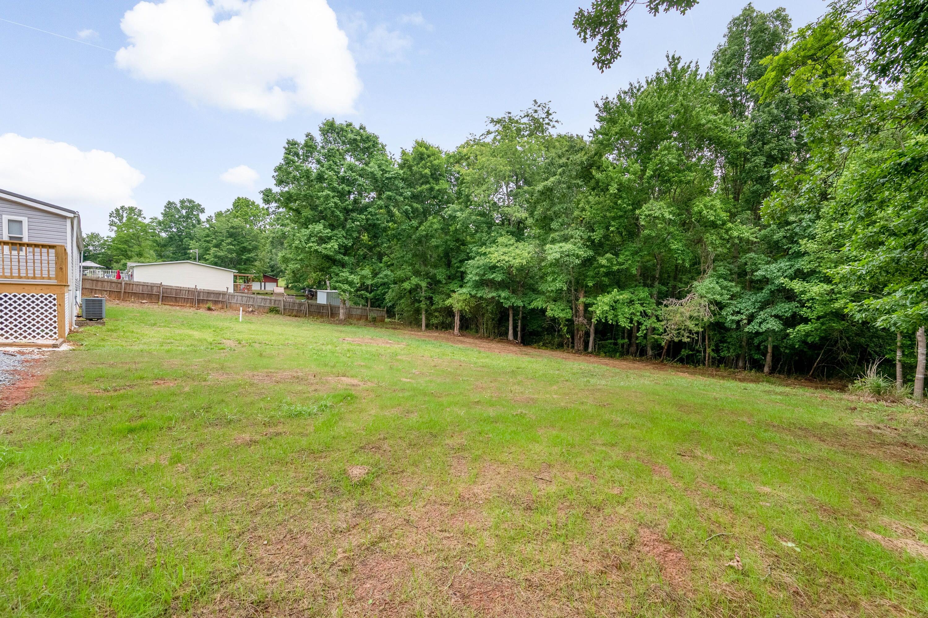 4342 County Line Road Patrick Springs, VA 24133 - Photo 10 of 34 a view of a field with a big yard