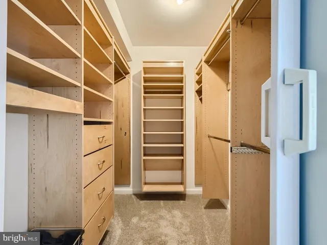a bathroom with a sink a mirror and a toilet