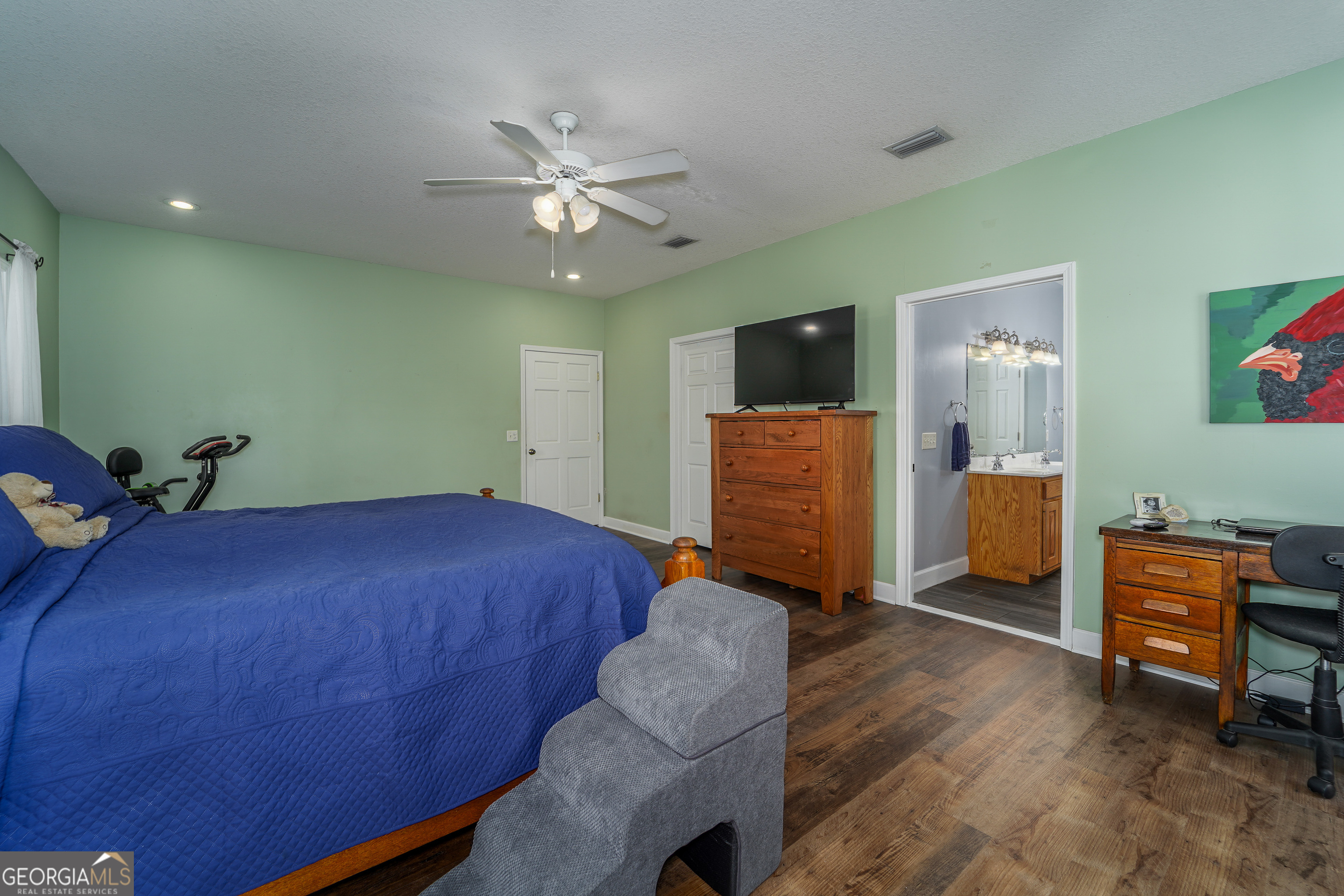 3300 Connor Lane Waycross, GA 31503 - Photo 30 of 42 a bedroom with a bed and furniture