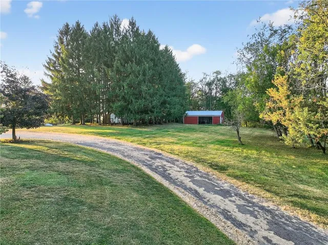 a fire hydrant in the middle of a field