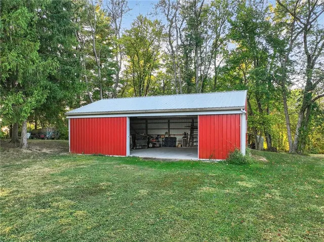 a view of parking garage with cars