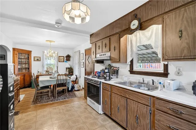 a bedroom with a bed and a flat tv screen
