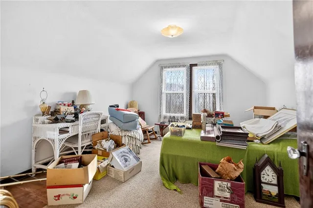 a room with furniture and a window