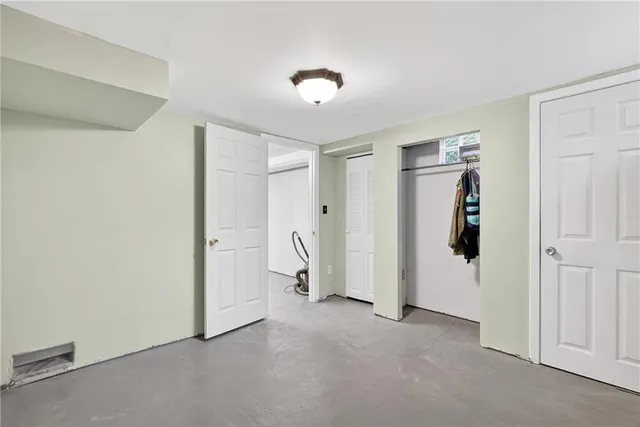 a view of a patio with table and chairs
