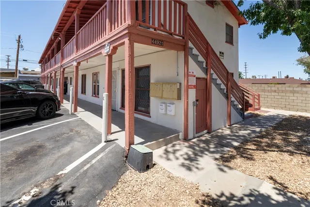 a view of a house with a snow in the yard