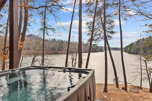 a view of a house with a snow on the side of the road
