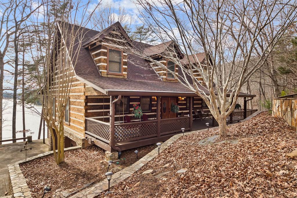 192 Grassy Knob Court Jasper, GA 30143 - Photo 2 of 88 a view of a house with a snow on the side of the road