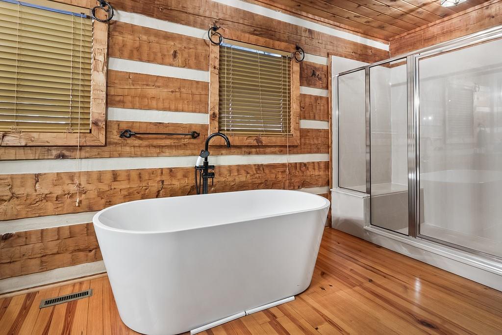192 Grassy Knob Court Jasper, GA 30143 - Photo 25 of 88 a view of a bathtub in a bathroom