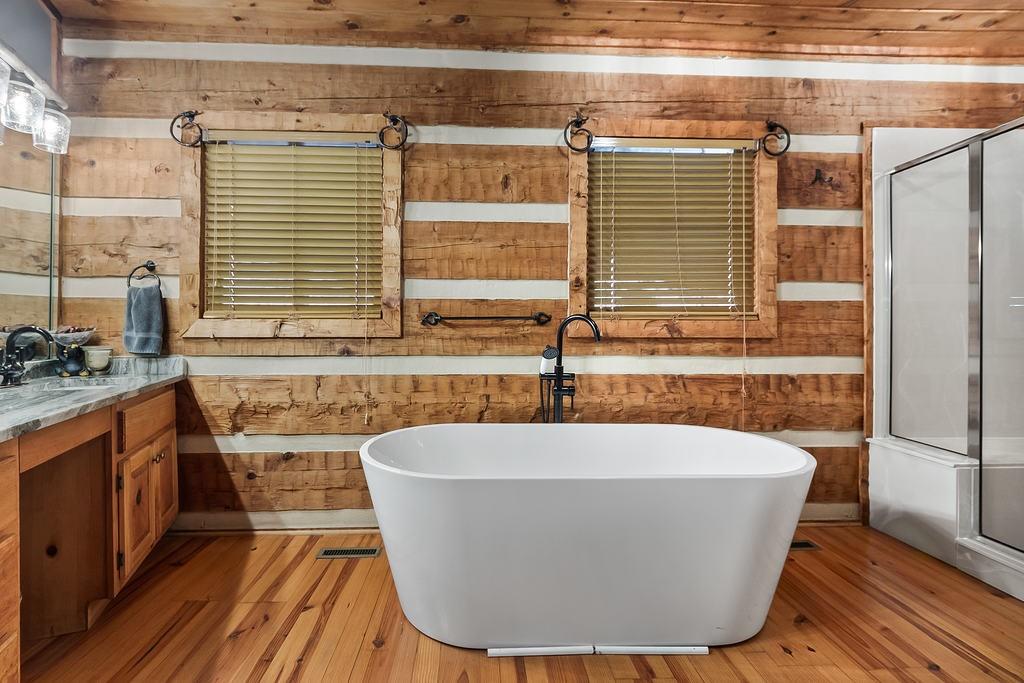 192 Grassy Knob Court Jasper, GA 30143 - Photo 27 of 88 a white bath tub sitting in a bathroom