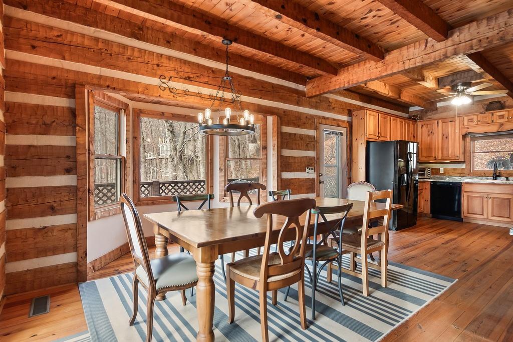 192 Grassy Knob Court Jasper, GA 30143 - Photo 31 of 88 a view of a dining room with furniture window and wooden floor