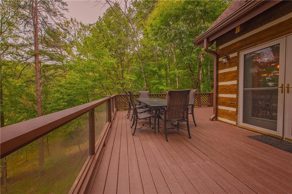 192 Grassy Knob Court Jasper, GA 30143 - Photo 38 of 88 a view of balcony with furniture and wooden floor