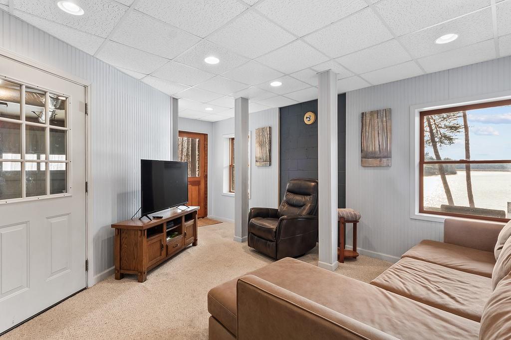 192 Grassy Knob Court Jasper, GA 30143 - Photo 61 of 88 a bedroom with a bed and a flat screen tv