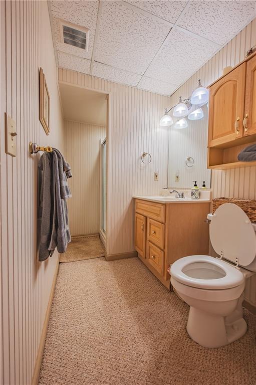 192 Grassy Knob Court Jasper, GA 30143 - Photo 65 of 88 a bathroom with a toilet sink and mirror