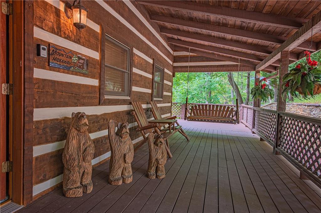 192 Grassy Knob Court Jasper, GA 30143 - Photo 10 of 88 a view of balcony with wooden floor and outdoor seating