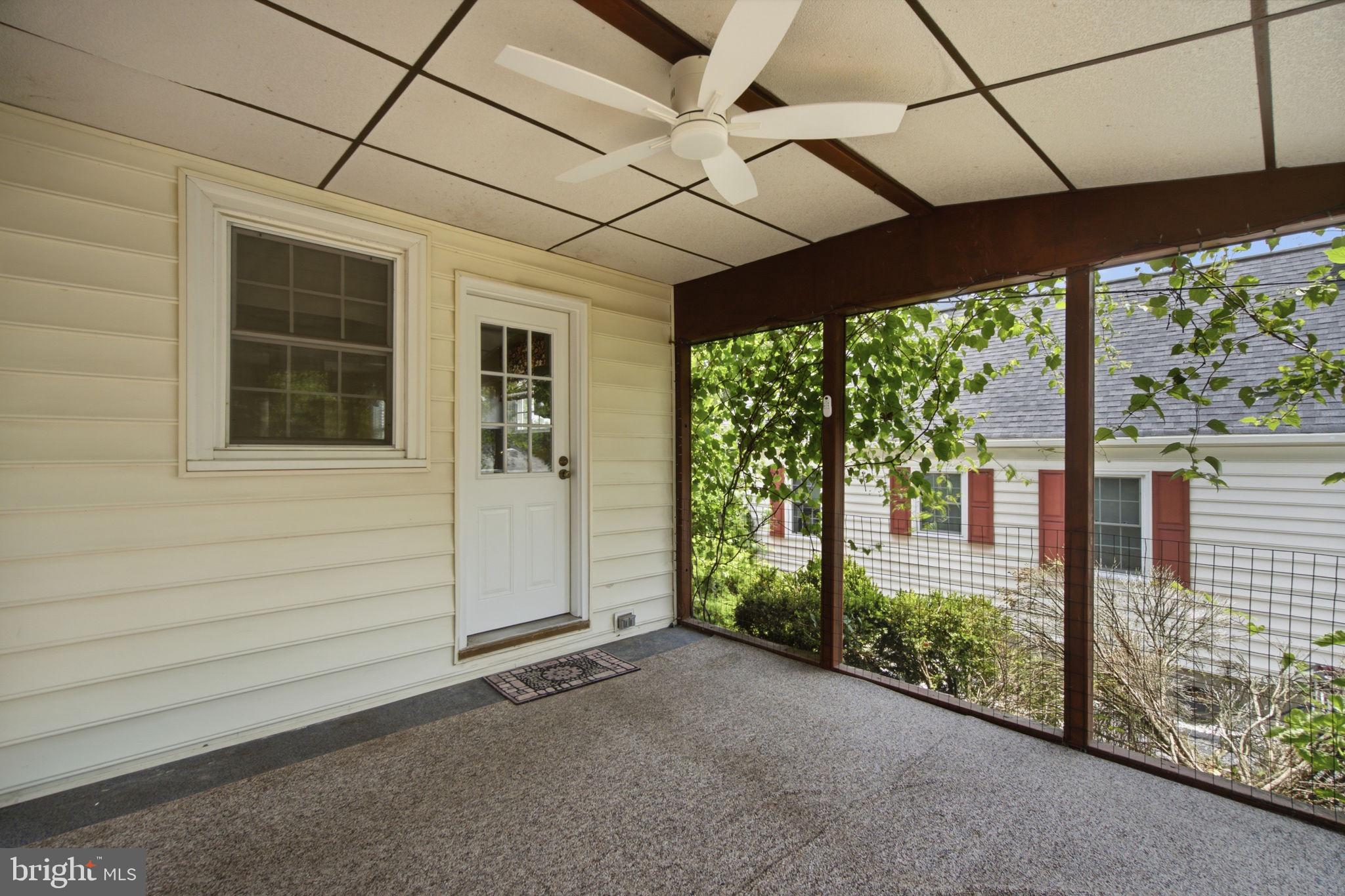 107 Oakway Road Lutherville-Timonium, MD 21093 - Photo 44 of 52 Screened porch with access to the kitchen