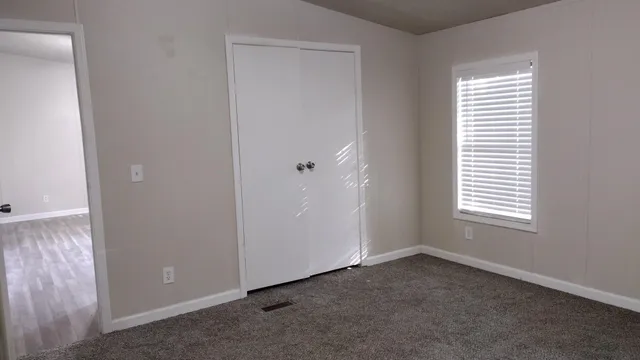 wooden floor and window in a room