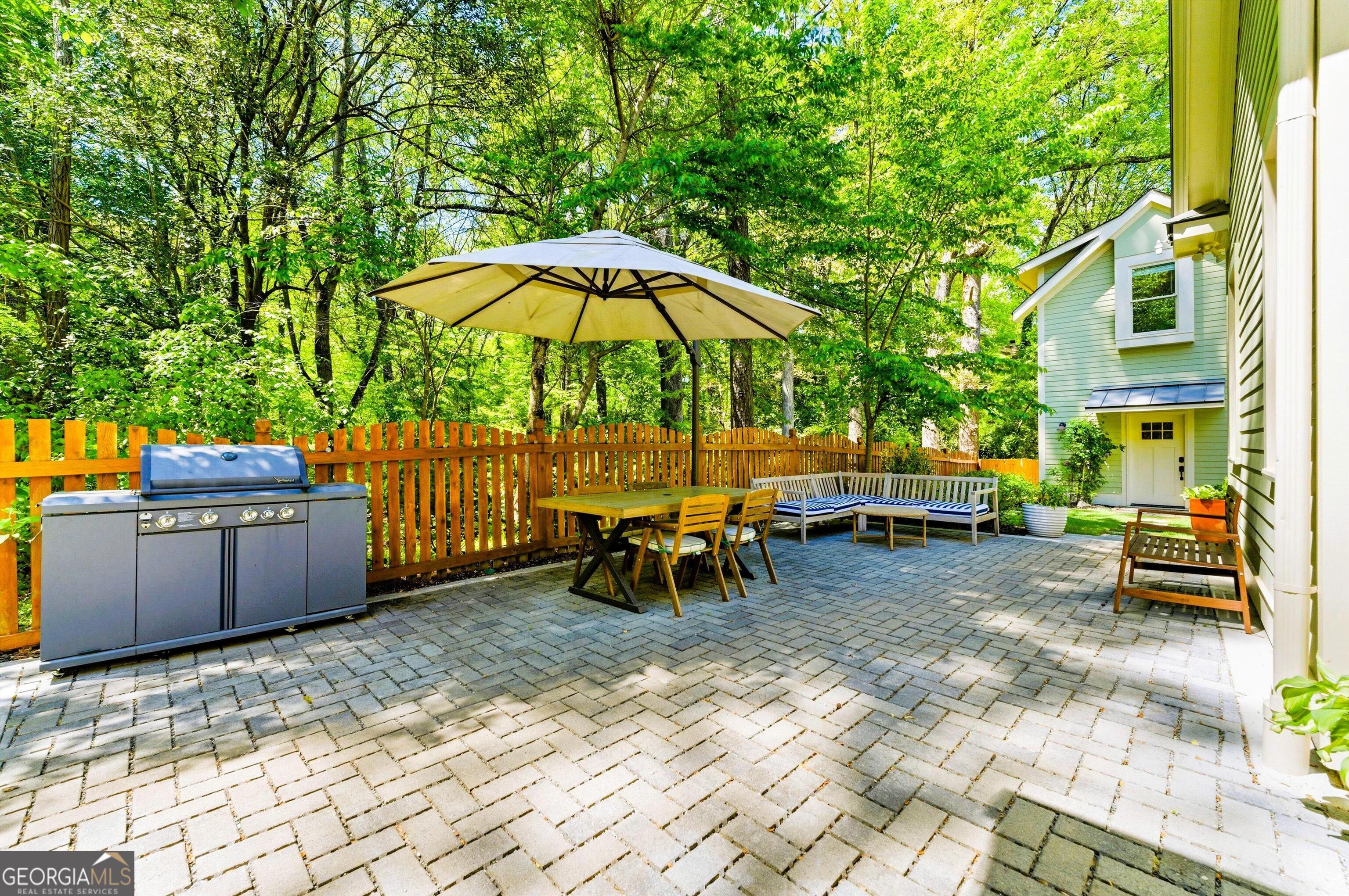 104 Fairview Street Decatur, GA 30030 - Photo 26 of 39 a view of a backyard with a patio and outdoor seating