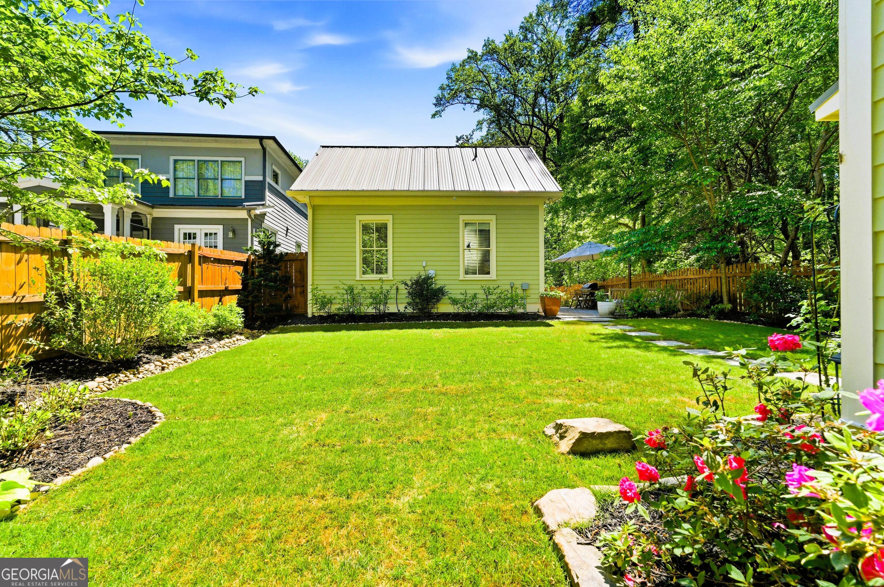 104 Fairview Street Decatur, GA 30030 - Photo 36 of 39 a front view of a house with a yard