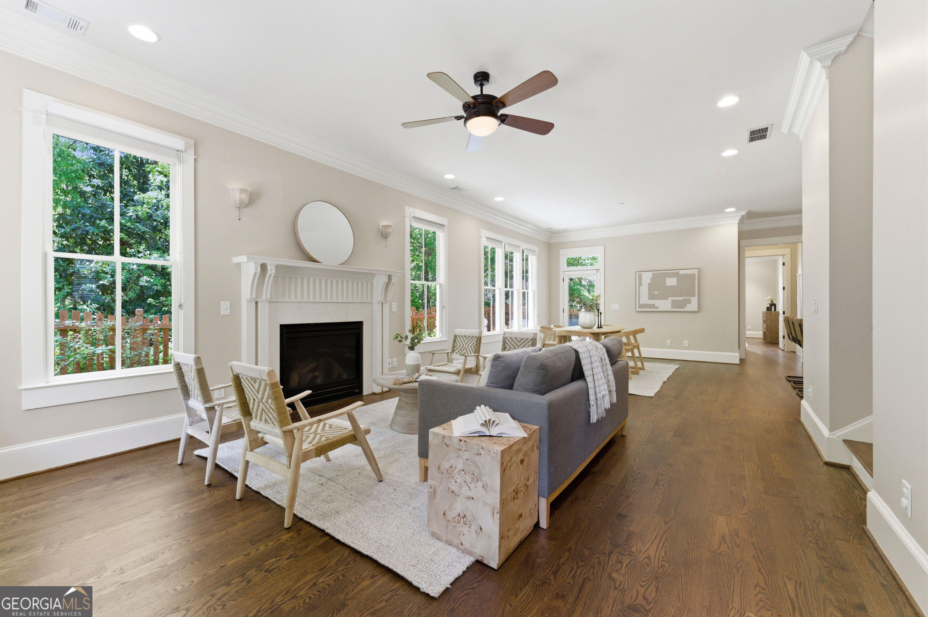 104 Fairview Street Decatur, GA 30030 - Photo 5 of 39 a living room with furniture a fireplace and a large window