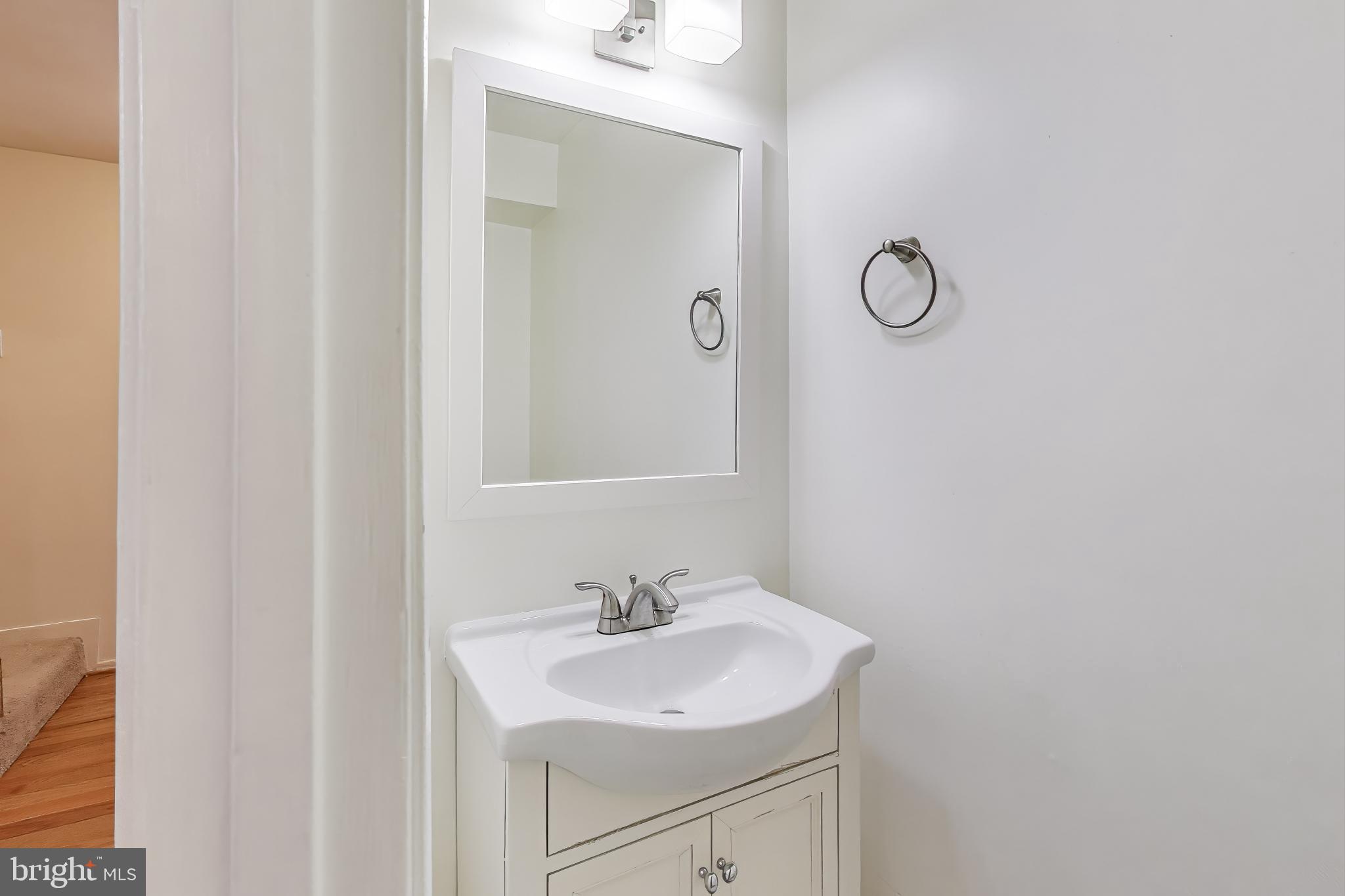 16 Tabiona Court Silver Spring, MD 20906 - Photo 13 of 34 a bathroom with a sink and a mirror