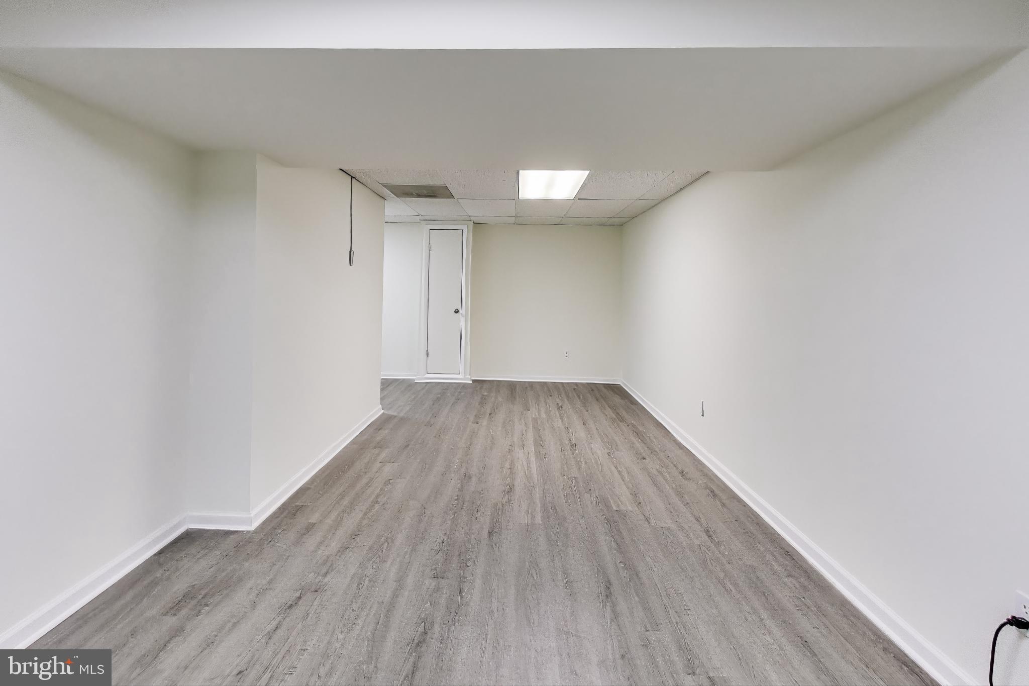 16 Tabiona Court Silver Spring, MD 20906 - Photo 25 of 34 a view of room with wooden floor
