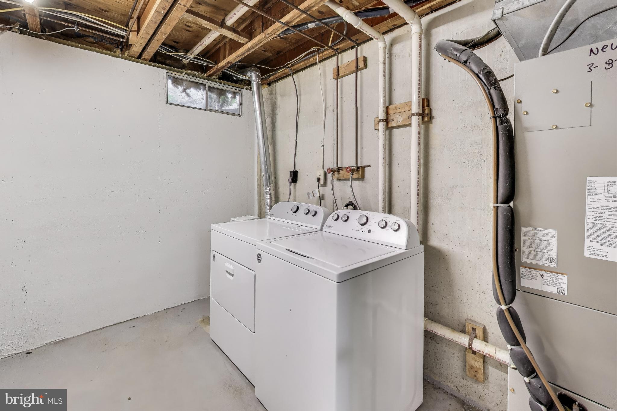 16 Tabiona Court Silver Spring, MD 20906 - Photo 27 of 34 a utility room with dryer and washer