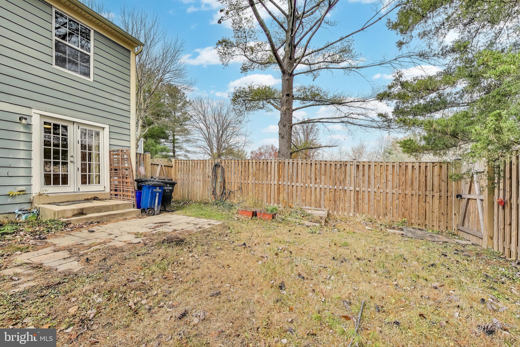 16 Tabiona Court Silver Spring, MD 20906 - Photo 32 of 34 a white house that has tree in front of it