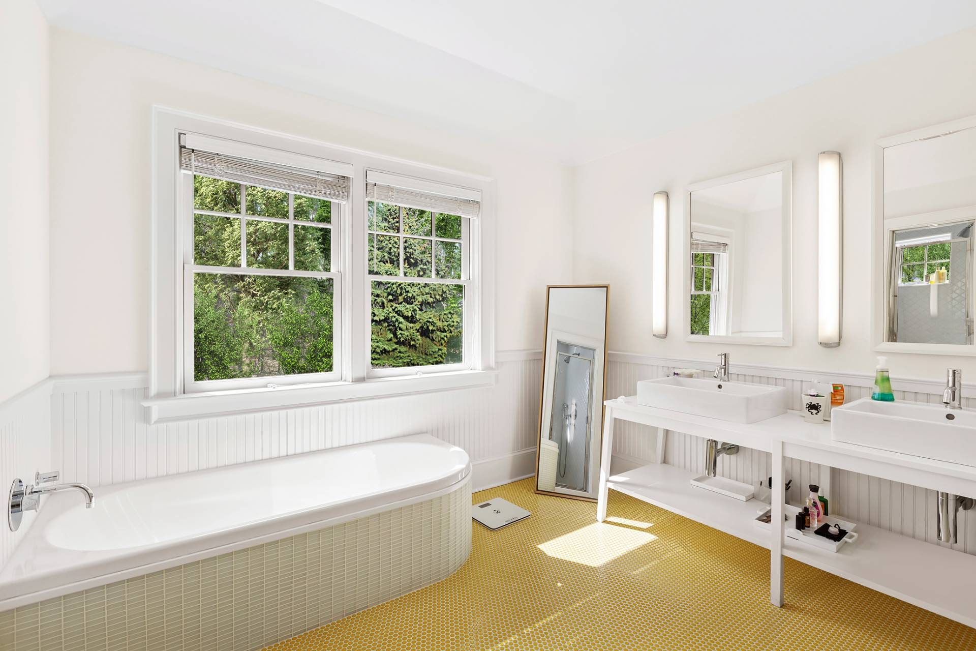 27 Gardiners Path Sag Harbor, NY 11963 - Photo 16 of 27 a bathroom with a tub a sink and a window