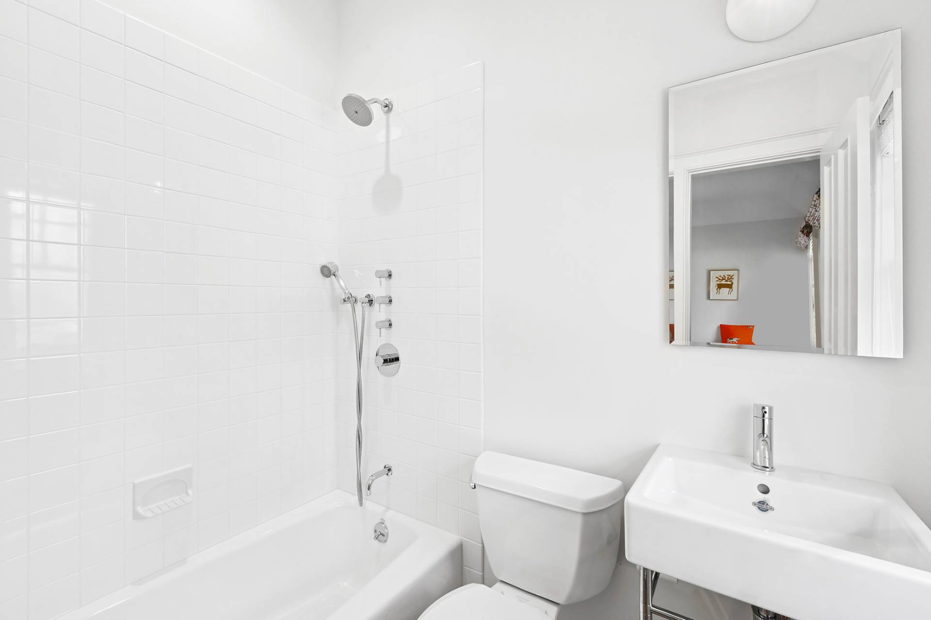 27 Gardiners Path Sag Harbor, NY 11963 - Photo 18 of 27 a bathroom with a sink and a mirror